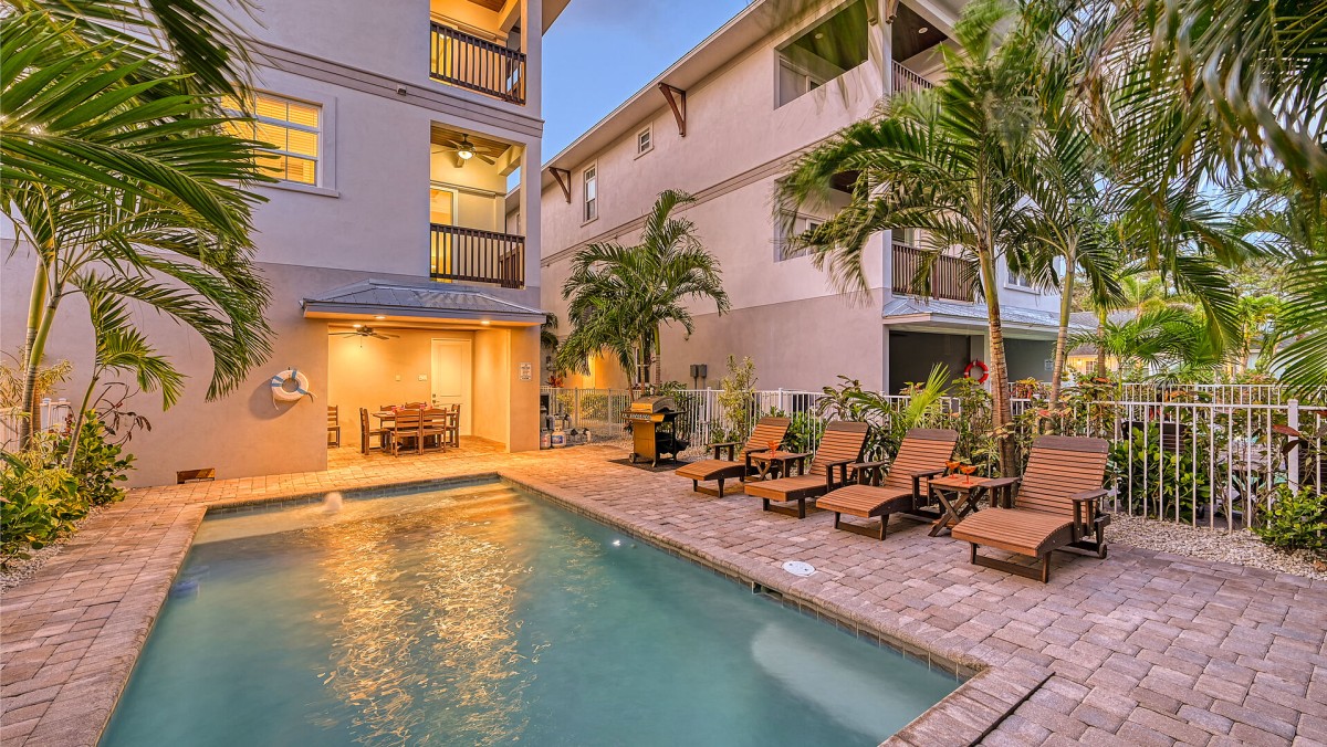 As the sun sets, your private heated pool becomes the perfect place to gather, swim, and relax.