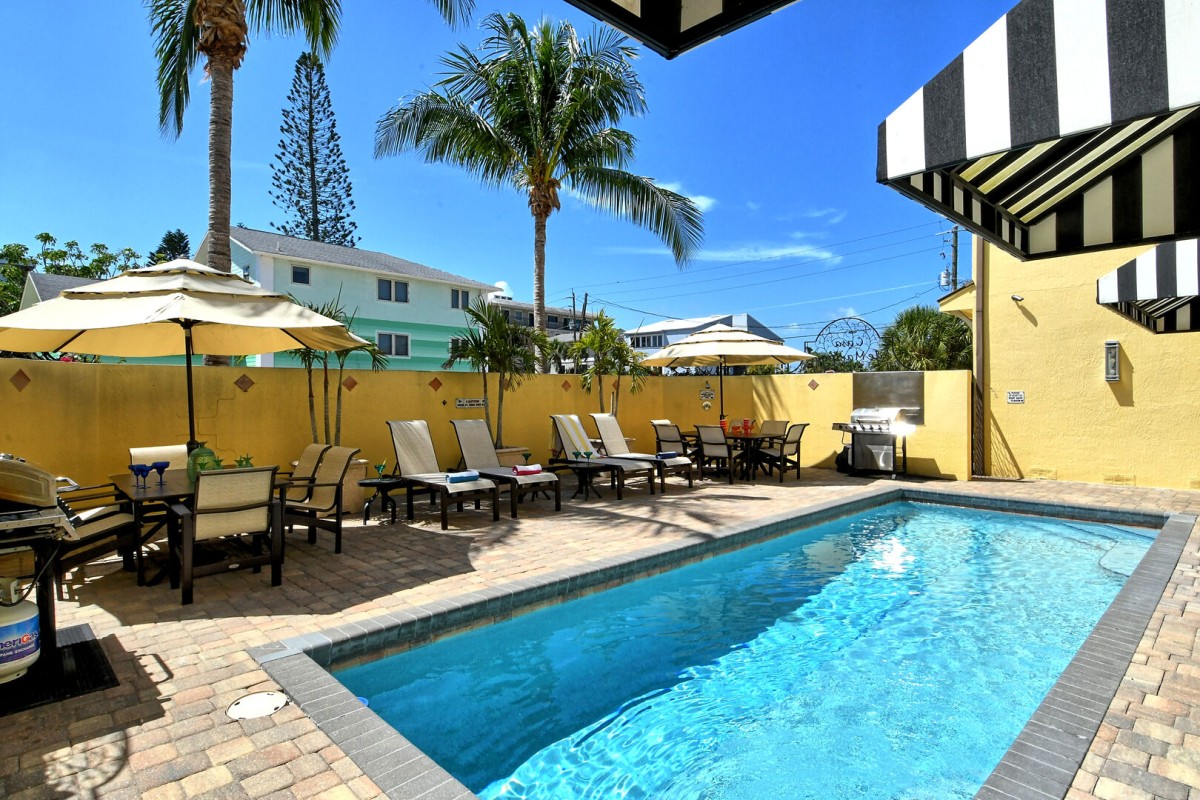Dive into the semi-private heated pool, steps from your private cabana and perfect for sunny days or evening swims.