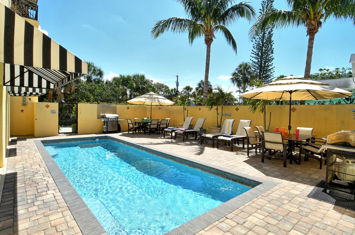 The semi-private heated pool is steps from your private cabana and perfect for sunny days or evening swims.