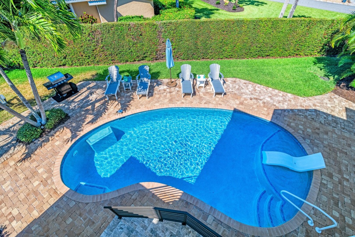 Slip into sun-drenched serenity—your private pool is the heart of every sun-soaked afternoon.