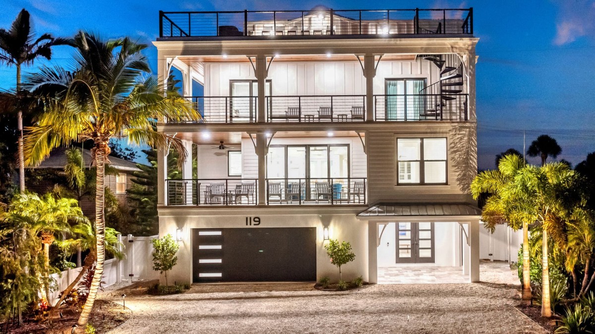 Night Time House Front View with rooftop patio.
