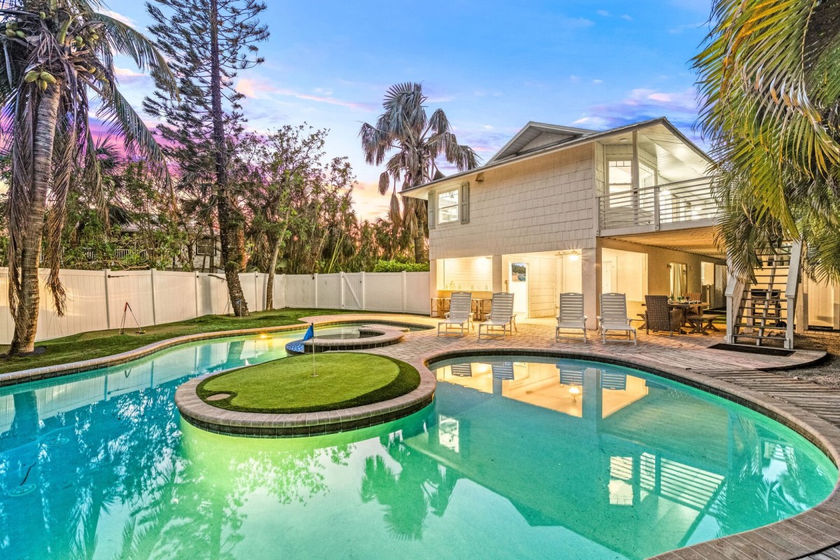 Welcome to The 19th Hole! Experience true island living at this beautifully designed Anna Maria Island beach rental.