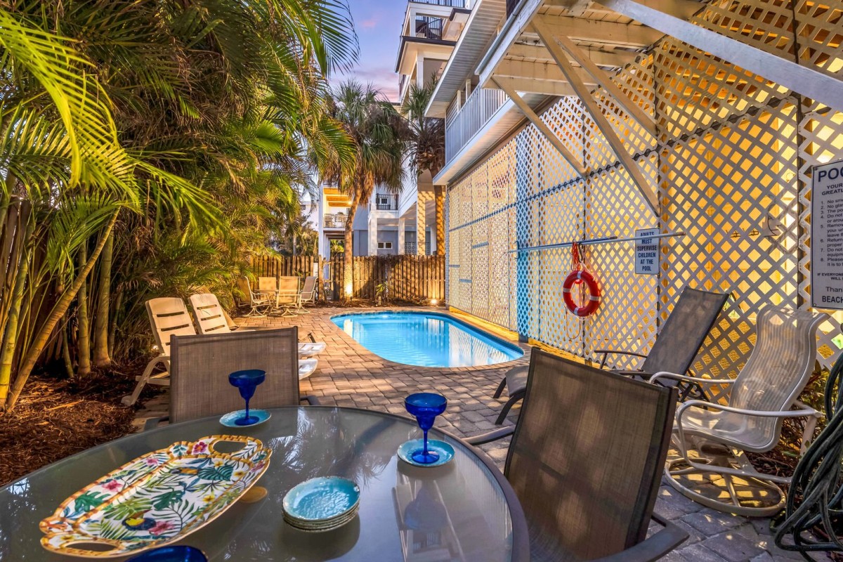 Whether it's quiet conversation or one last swim, this glowing outdoor space is the definition of Siesta Key serenity after sundown.