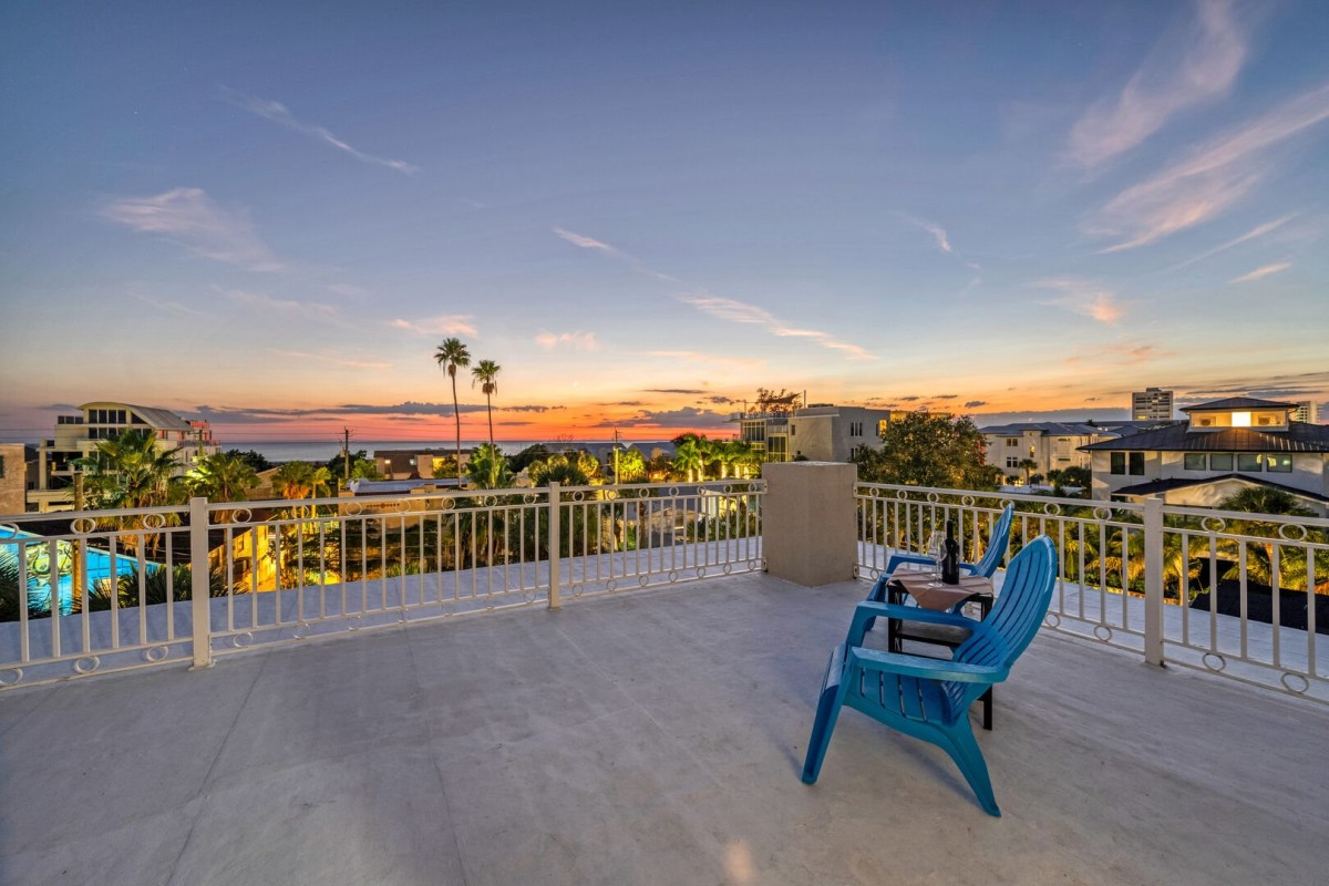 Feel the warmth of the setting sun as you relax with wine and laughter under a painted sky.