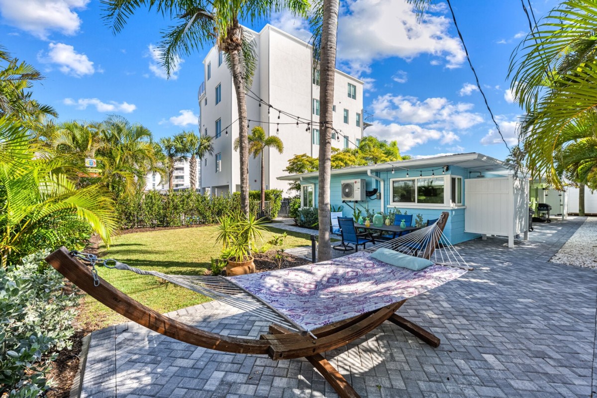 Spend afternoons here with a hammock, shaded patio seating, and tropical surroundings.