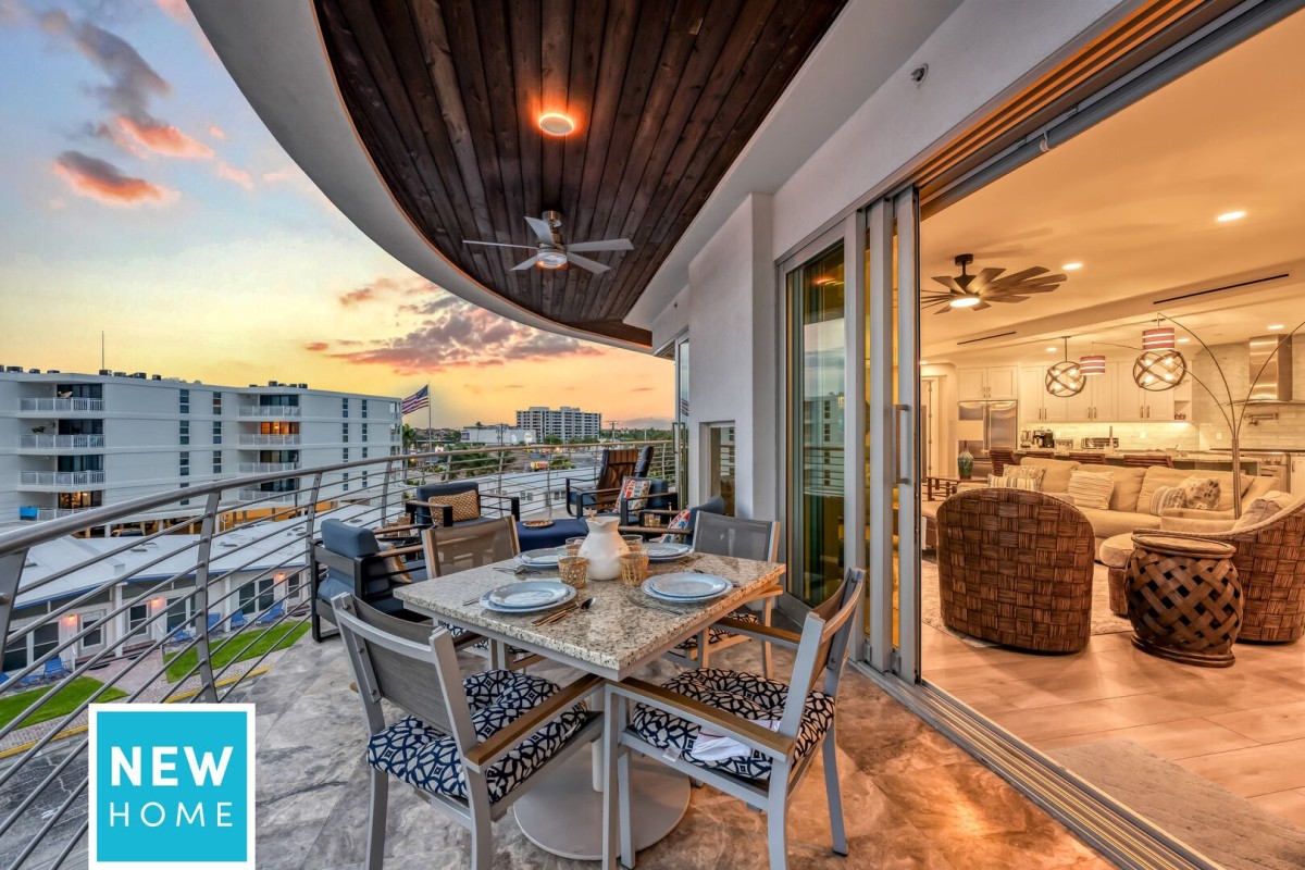 Evenings on the covered balcony are even better with al fresco dining, comfortable seating, and glowing Gulf sunsets.