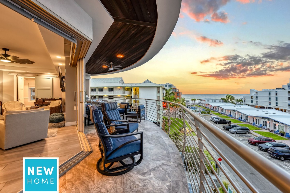 Your private balcony is the perfect place to unwind with Gulf views, comfortable seating, and unforgettable sunsets.