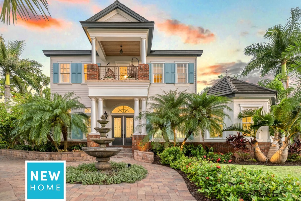 Casa De La Cascada welcomes you with lush landscaping, an elegant façade, and a charming courtyard fountain.