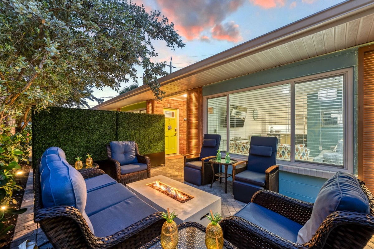 Watch the sunset gathered around the glowing fire pit with plenty of seating for the whole crew.