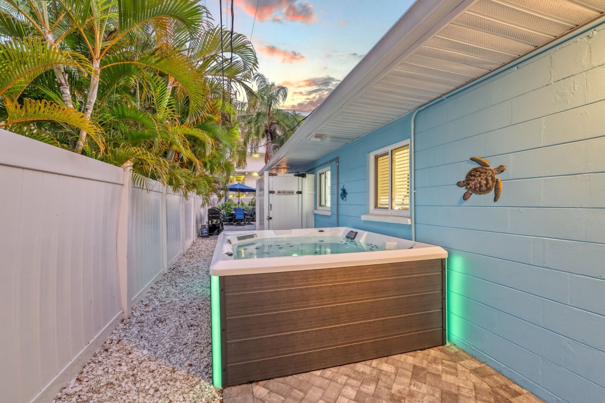 End the evening with a warm soak in the hot tub, surrounded by tropical greenery.