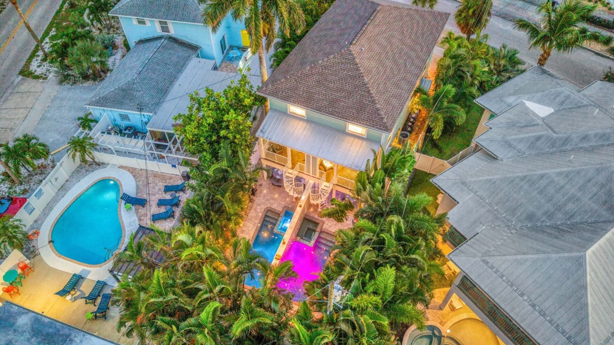 Welcome to Village Vibe! This unique duplex offers two private heated pools and spas, giving everyone room to spread out while staying together.