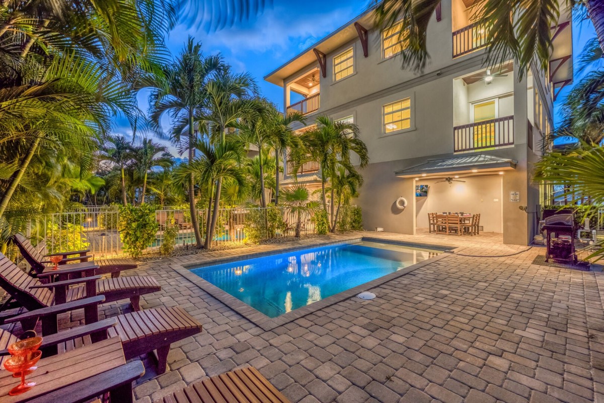 As the sun sets, your private heated pool becomes the perfect place to gather, swim, and relax.