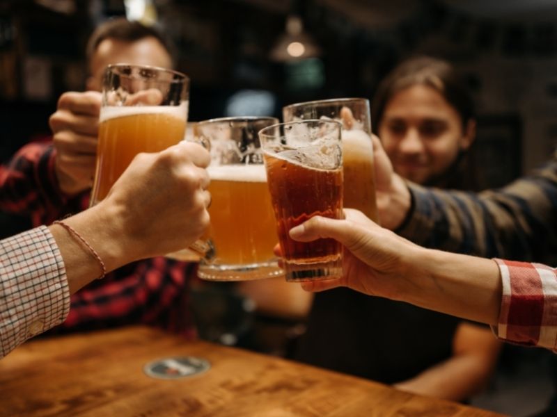 group cheers with beer