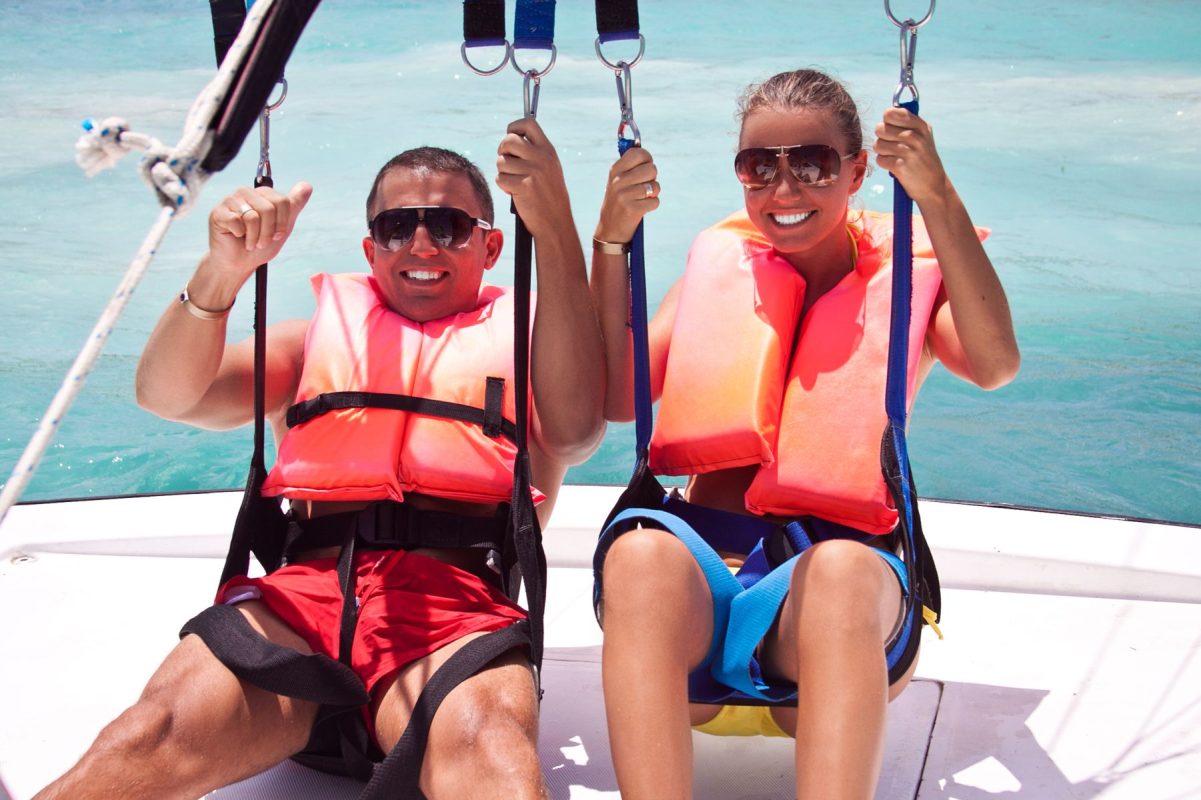 couple going parasailing in Siesta Key