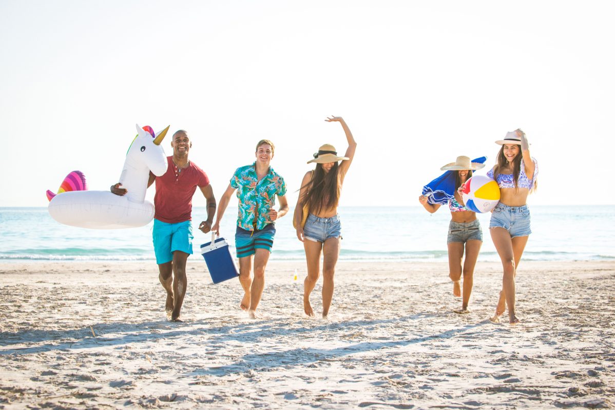 group of friends on the beach in Lido Key